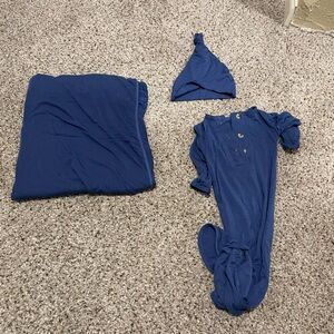 Newborn swaddle, gown, and hat